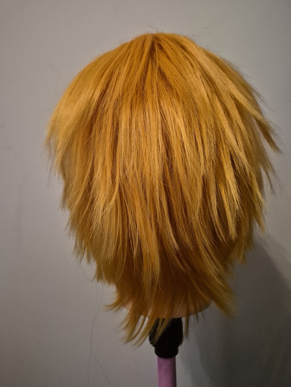 Women's Short Layered Synthetic Wig in Vibrant Orange